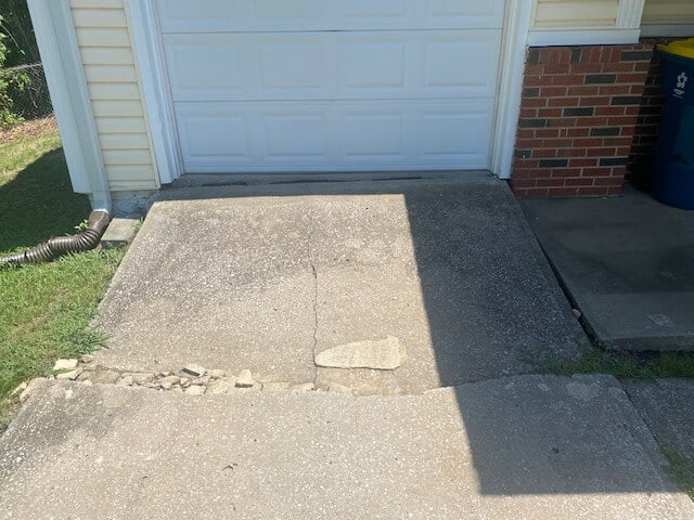 Driveway Replacement Damaged Front View